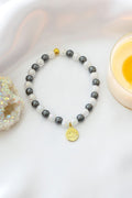 Brățară Elastică din Hematit | Amuletă Floare de Lotus placată cu Aur 24K